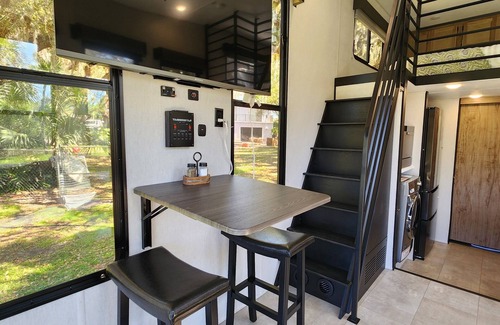 Fort Pierce House | Tiny home next to private pond on 1.75 acre fenced in homestead property.