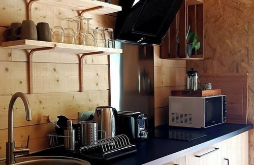 Grendelbruch Apartment | Tiny-house cottage style