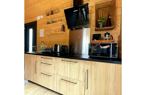 Grendelbruch Apartment | Tiny-house cottage style