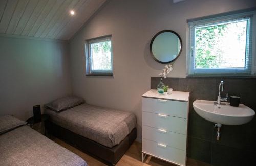 Oirschot Ski Chalet | Tiny House in Brabant with Cozy Terrace