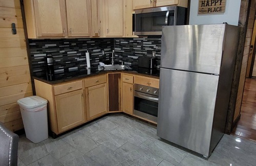 Tiptonville Cabin | Tiny house on the lake With a seventy five inch t v free internet walk shower