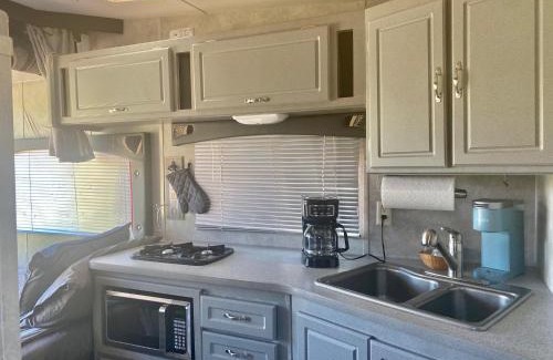 St. George House | Tiny RV Stone pool Inn, Pets stay free, Zion National Park, your private Oasis!