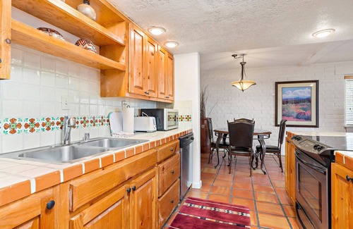 Northeast Santa Fe Hotel | Tons Of Space With A Kiva Fireplace And Private Balconies