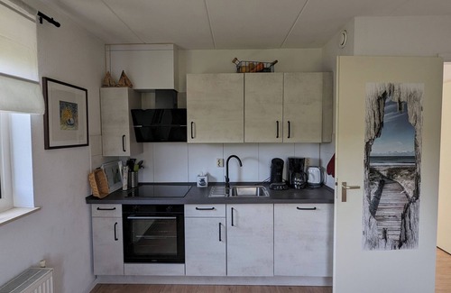 Julianadorp aan zee Villa | Top vacation villa 120 sqm, close to the beach, 2 bathrooms, WLAN, fireplace, bed linen included
