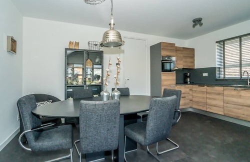 Oude-Tonge House | Tough and industrial with lots of space around the house for storing your fishing or cycling equipme