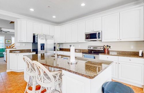 Sunset Island House | Townhome w/Canal & Bay Views, 2 Wrap-Around Decks - Walk to Pools/Beach