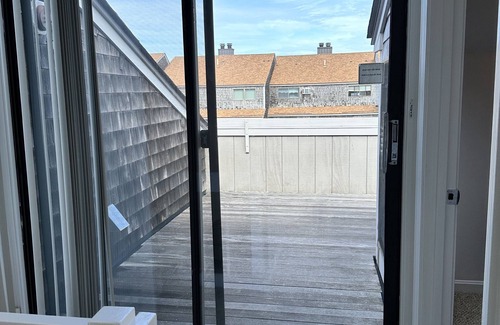 Hyannis House | Townhouse less than one-minute walk to a private beach and heated pool on site