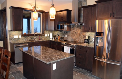 Big White Ski Resort House | tPowder Peaks on Feathertop Hot Tub Fireplace Ski-In/Ski-Out Home