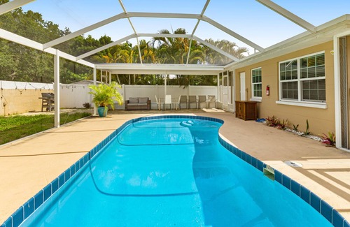 Walsingham House | Tranquil escape with screened pool, fenced yard, lanai, & Pinellas Trail access
