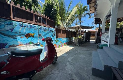 Mabini Hotel | Tranquil Getaway Lilly Room, Dahlia Room, Aster Room and Poppy Room & Dive Center