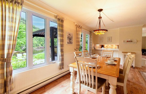 Saint-Raymond Ski Chalet | Tranquil Riverfront Chalet with Hot Tub