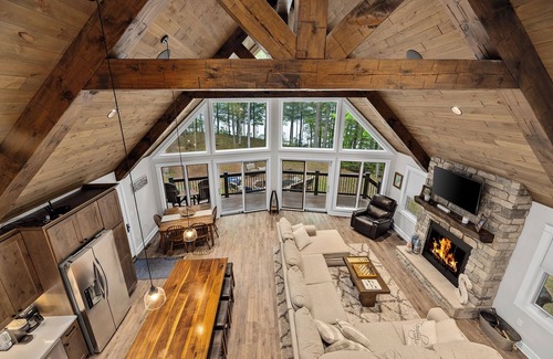 Lac du Flambeau House | Tranquility Point | LUX lakefront retreat, private dock, firepit, kayak, & AC