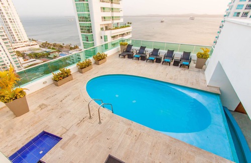 Castillogrande Apartment | Travelers Suites Orange Cartagena