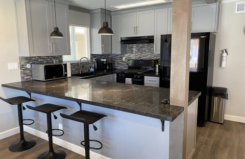 West Newport Condo | Treasured Retreat- 3 Houses from Beach-REMODELED - Exclusive Patio - Clean