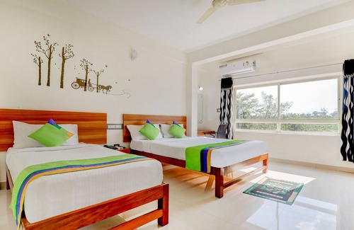 Kushalnagar Hotel | Treebo Atithi Comforts, 1 Km From Nisargadhama Forest