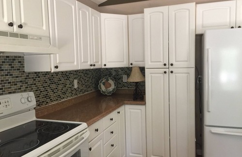 Pottsboro House | TREES AND DECKS AND TOTALLY UPDATED 2 BEDROOM COTTAGE