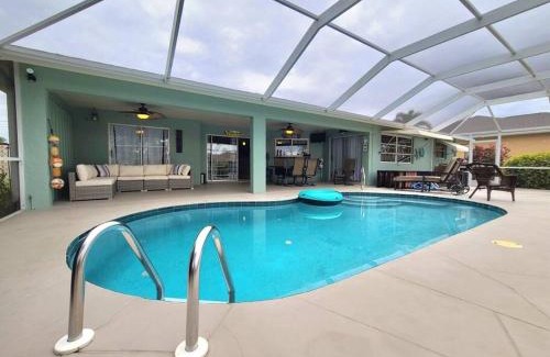 Cape Coral House | Tropical Breeze Canal Waterfront Home, Heated Pool