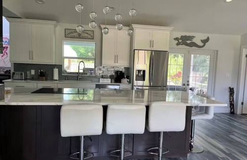 Tequesta House | Tropical paradise - 3 bedrooms, a pool & a Tiki Hut in beautiful Jupiter Florida