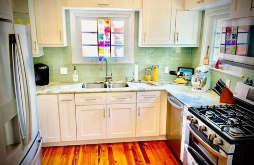 Parrot Cove House | Tropical Paradise, Beautiful Pool Home.