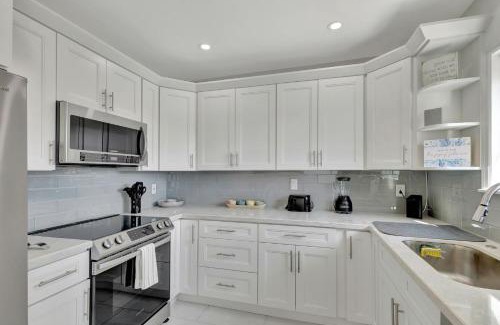 Parrot Cove House | Tropical Pool Home on Golf Course & Near Beach