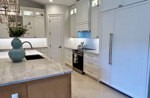 Longshore Lake House | Tropical Retreat - pet friendly 3 bedroom 3 bath home with pool and hot tub.