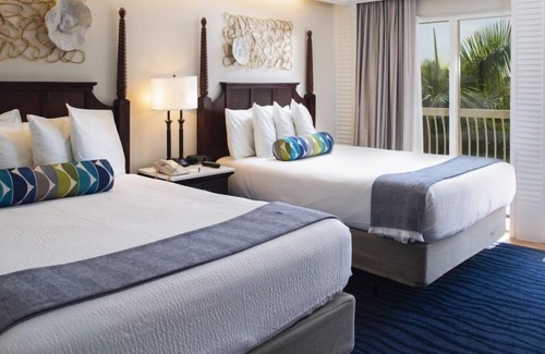 St. Pete Beach Hotel | Tropical View Villa 2BR With Balcony 4 Queen Beds at Island Grand at TradeWinds