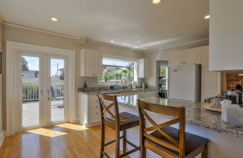 Southeast Magnolia House | Tudor Style Home in Relaxed Magnolia Neighborhood