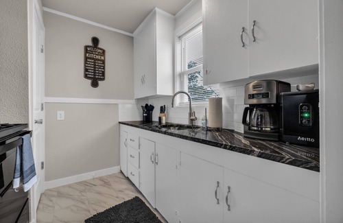 Sunrise Terrace House | Tulsa Getaway w/Pergola-Grill-TV's & Personal AC/Heater in Every Bedroom