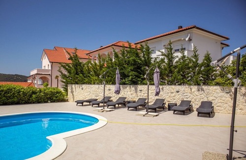 Lopar Apartment | Two bedroom apartment with balcony Lopar, Rab (A-22978-b)