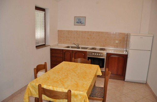 Lopar Apartment | Two bedroom apartment with balcony and sea view Lopar, Rab (A-23747-b)