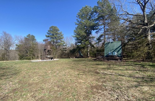 Kingston RV Rental | Two cozy pods with water tower