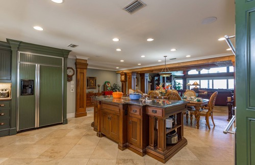 Villa Primera House | Two kitchens, 2 living areas, 5 beds, 4 baths & game room! Soundfront pool