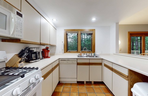 Ludlow Condo | Two-story condo with forest views, Echo Lake beach access, pool, dock & tennis