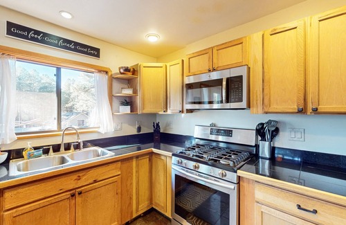 Mountainaire House | Two-story home with sunroom, large yard, fire pit, & BBQ grill