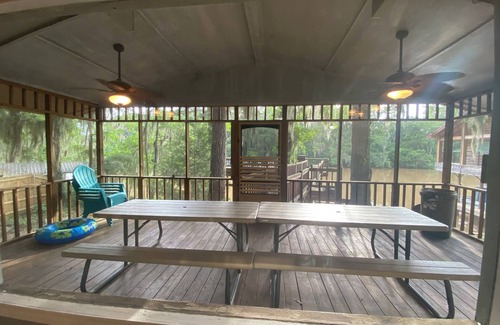 Jefferson House | Two Story House with deck over the river