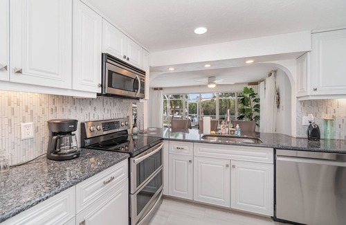 Lochmoor Waterway Estates House | Ultimate Riverfront Escape w/private heated pool