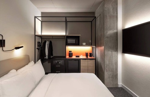 Brossard Hotel | Unwind in Modern Room w/ Chic Design + Large Windows in Prime Location | 3 Units