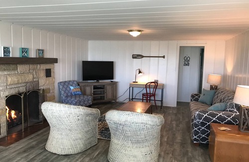 Pigeon House | Updated Cottage with Large Deck & Private Beach on Caseville's Sand Point