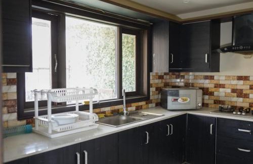 Dhirkot House | Urban Homes - Top Floor - Ayubia