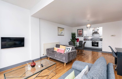 The Westside Apartment | Urban Oasis: Garden Views, Balcony, Free Parking