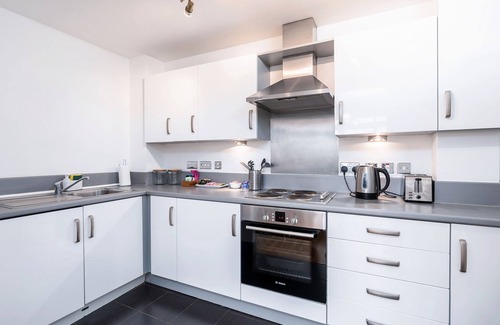 The Westside Apartment | Urban Oasis: Garden Views, Balcony, Free Parking