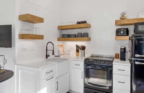 Gallatin House | Urban Rustic Boathouse on Cove