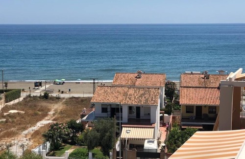 Moclinejo Apartment | Vacation apartment, directly on the beach with 2 terraces.