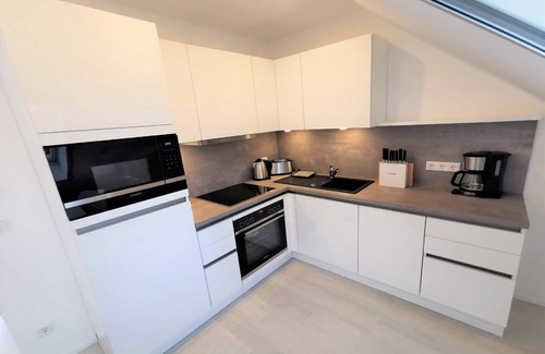 Gross Zicker Apartment | Vacation apartment with roof terrace and sea view - Haus Inselwind FeWo MEERwasser