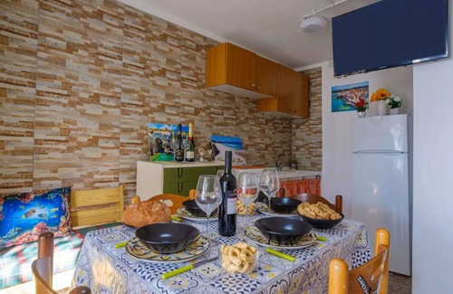 Torre Specchia Ruggeri House | Vacation Home in Torre Specchia Ruggeri with 1 bedrooms sleeps 5