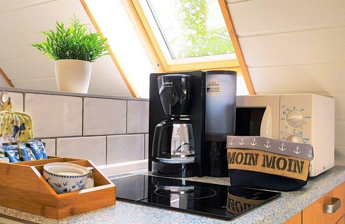 Dornumergrode Apartment | Vacation apartment right on the North Sea with terrace and garden for sunbathing