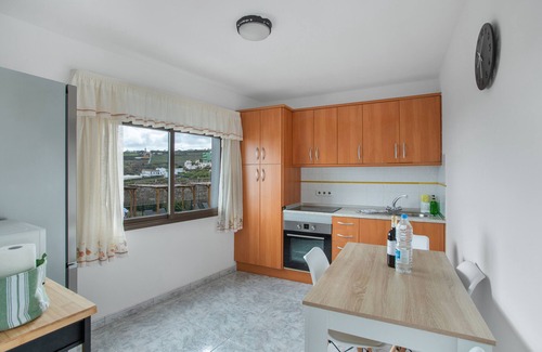 Moya Apartment | Vacation 'El Granero' with Shared Terrace, Shared Garden and Wi-Fi