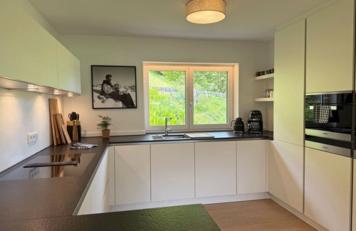 Oberstdorf House | Vacation home Allgäu: eat-in kitchen, fireplace, 4 bedrooms, 3 bathrooms, terrace & hot tub