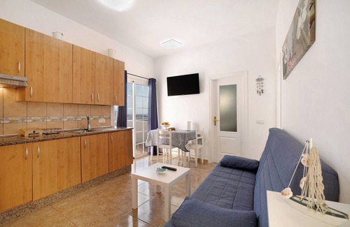 Las Arenas Apartment | Vacation Home "Atico Las Arenas" with Sea View, Private Terrace & Wi-Fi