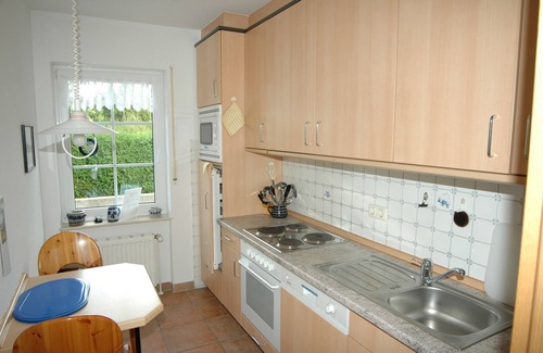 Dornumersiel House | Vacation home directly on the river, close to the beach, WLAN, TV, 6 beds, own jetty